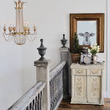 The white walls contrast with the striking dark railing. Farmhouse Stair Railing Ideas And Inspiration Hunker