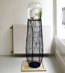 Bird cage seed guard acrylic. Aquarium And Bird In A Cage Design The Concept Duplex Interior Design Ideas Ofdesign