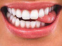 lip biting causes treatment when to