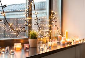 decorate a window with christmas lights