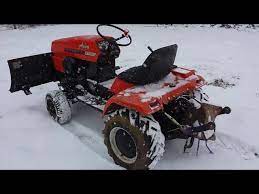 ariens s 18h garden tractor snowplowing