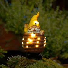 16 playful garden gnome with led solar