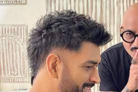 in pics ms dhoni s new hairstyle is