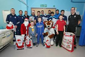 bucks players visit hospital youngsters