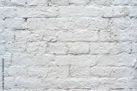 Brick Wall Painted With White Paint