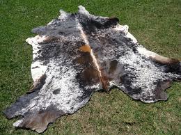 how are cowhide rugs made