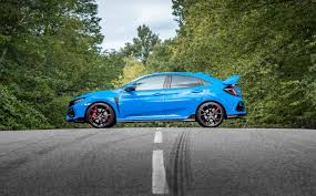 You'll recognize it by its body color grille accents, a bigger grille opening and a little less mesh over some of the fake vents. 2020 Honda Civic Type R Review