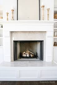Cleaning Inside A White Fireplace
