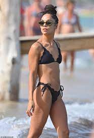 Tessa Thompson, 39, flaunts her incredible figure in a tiny black string  bikini while going for a swim in St Tropez 
