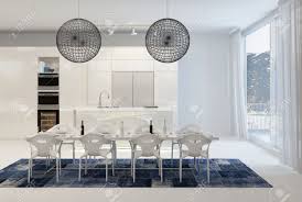 Modern Dining Table With Wire Globe Light Fixtures In White Kitchen Stock Photo Picture And Royalty Free Image Image 38436810