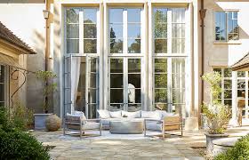 Backyard With Tall Gray French Doors