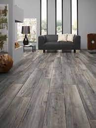 Our experts are with you at every step of the process to ensure your project is a success! Grey Oak Effect 10mm Narrow Laminate Flooring Floor Depot