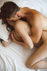 Passionate Young Couple Making Love In Bed by Stocksy Contributor Simone  Wave - Stocksy