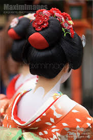 photo of two maiko geishas red kimonos