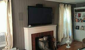 Wood Wall Tv Over Fireplace Remote