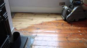 sanding hardwood floors with belt