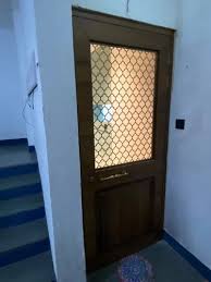 Wooden Safety Doors With Wall Paneling