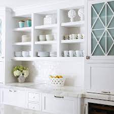 White Kitchen With Blue Glass Cabinet