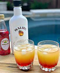 Malibu is a coconut flavored liqueur, made with caribbean rum, and possessing an alcohol content by volume of 21.0 % (42 proof). Malibu Sunset Cocktails The Cookin Chicks