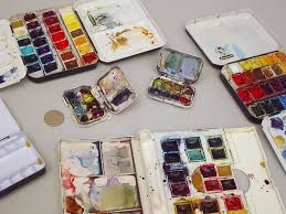 filling watercolor pans with paint