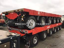 Spmts are used for transporting massive objects such as large bridge sections, oil refining equipment, cranes, motors. Scheuerle Spmt Trucks4trailers