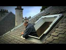 old velux roof window in a slate roof