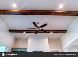 ceiling fan with lights between
