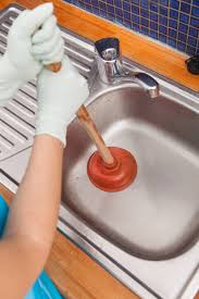 how to clean a clogged drain the green