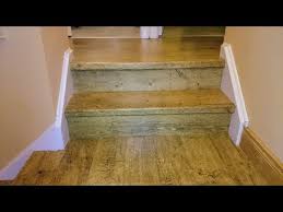 quick step harvest oak planks on stairs