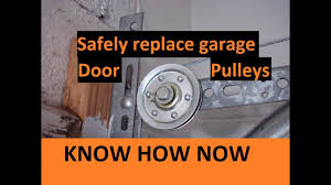 My cables came off my garage door. How To Replace Garage Door Pulleys Youtube