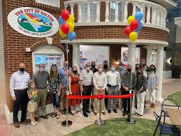 cut ribbon at ja discovery center