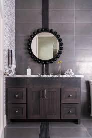 Round lighted vanity mirror often contain additional features such as bulbs studded around the edge or led lighting and enhance visibility while adding a stylistic element. We Re Obsessed With Round Mirrors In The Bathroom Laura U Design Collective