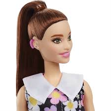 barbie unveils its first doll with