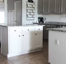 how to repaint laminate cabinets the