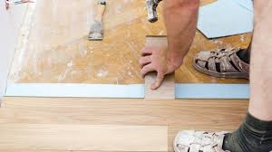 can flooring be laid over tiles