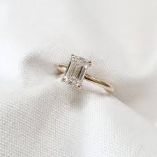 The ring is a size 7.5 (us), made of platinum and 18k yellow gold, and weighs 4.3 dwt (approx. Eva Diamond Emerald Cut Engagement Ring Kate Kole