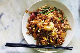Eggs, beansprouts, chives and flat noodles are all thrown into the wok, fried gloriously in big flames. 10 Best Char Kuey Teow To Eat In Kuala Lumpur