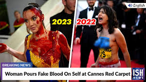 fake blood on self at cannes red carpet