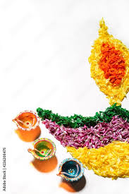diwali rangoli made in shape of diya