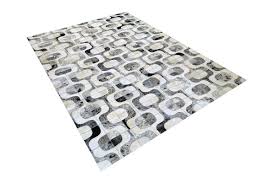 grey and white roads cowhide rug