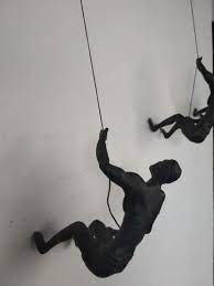 Fiber Metal Climbing Man Wall Sculpture