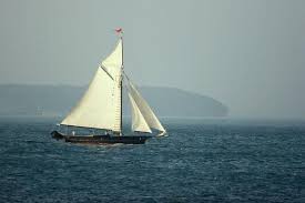how do sailboats sail into the wind