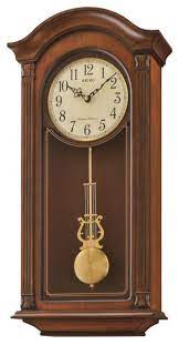 Seiko Clocks Gold Tone And Arched Wall