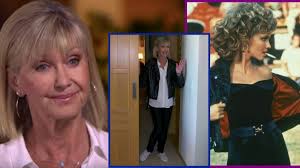 The grease star is also selling a pink ladies jacket, her original script for the movie and a dress she wore to the premier to raise money for her cancer charity. Olivia Newton John Puts On Grease Costume Talks Cancer Diagnosis