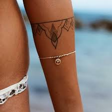 If you need to cover up your arm tattoos, all you have to do is wear some long sleeves. Peace Friendship Bracelet Anklet Delicate Bracelet Summer Custom Friendship Bracelet Sorority Peace Jewelry Gi In 2020 Tattoo Bracelet Ankle Tattoo Designs Arm Jewelry