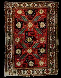 antique pinwheel or kazak rug