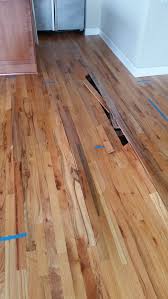 Should you repair or replace? Water Damage Wood Floors Cupping Wood Flooring