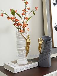 Check out our resin flower vase selection for the very best in unique or custom, handmade pieces from our vases shops. Resin Vase Abstract Golden Man Handicraft Furnishings Modern Home Decoration Accessories Art Character Flower Arrangement Nordic Wall Canvas Home And Decoration