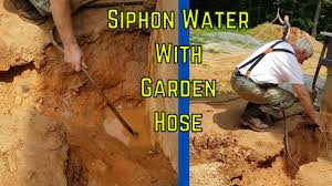 how to siphon water using a garden hose