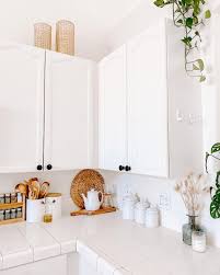 decorate the top of your kitchen cabinets
